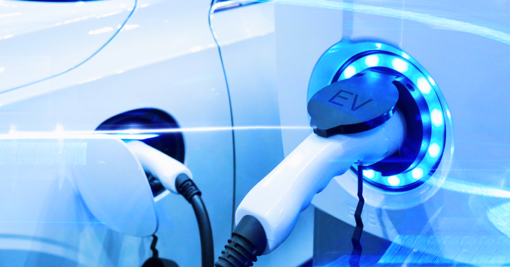 Utilimarc - How to Understand the ROI of Your Electric Vehicle  Image is of a plug in electric vehicle